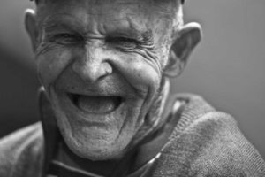 old man with a big smile